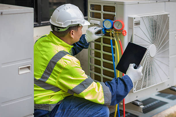 Professional Hvac technician working in Devine, TX